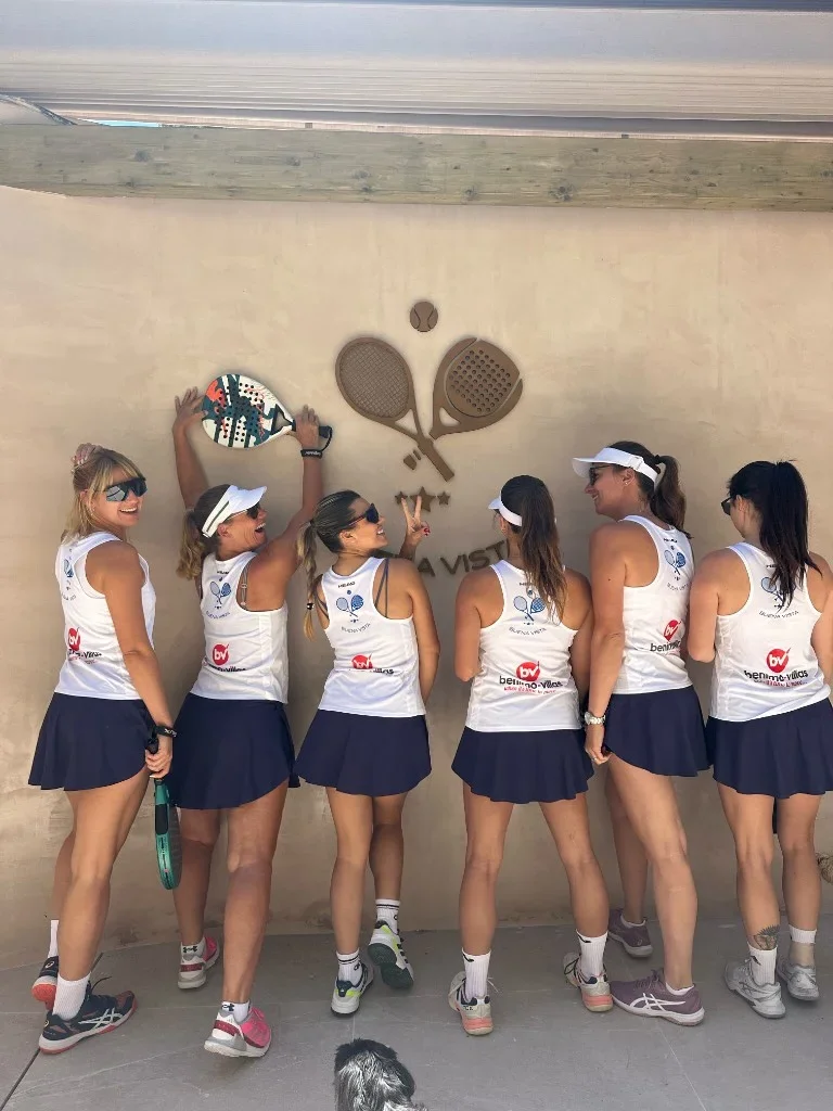 Team at the club wall